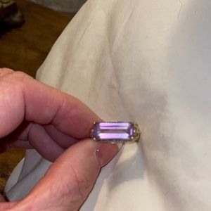 Very gorgeous amethyst ring in a unique setting with diamond chip side accents
